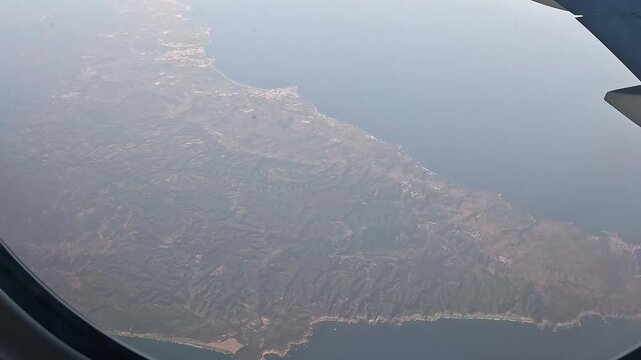 Views from the window of an airplane in full flight