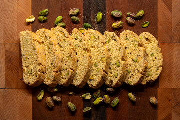 Artisan Italian Biscotti Arranged on a cutting board with pistachios