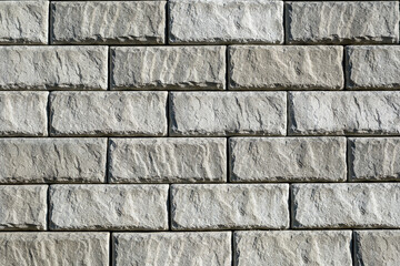 Background from a wall made of gray bricks