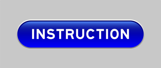 Blue color capsule shape button with word instruction on gray background