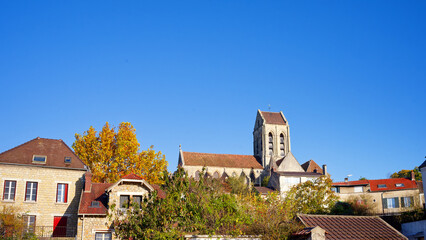 Church tower of Auvers-sur-Oise village in Île-de-France region