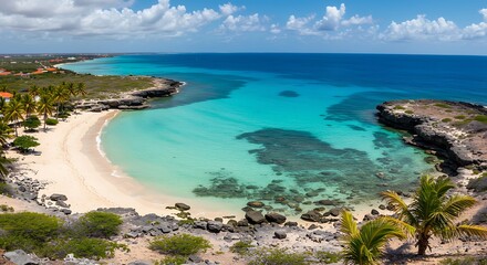 Panoramic view of a turquoise bay with sandy shore, cliffs, and clear blue sky