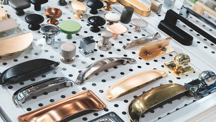 Furniture fittings for installing cabinet doors, handles for doors, cabinets and drawers.