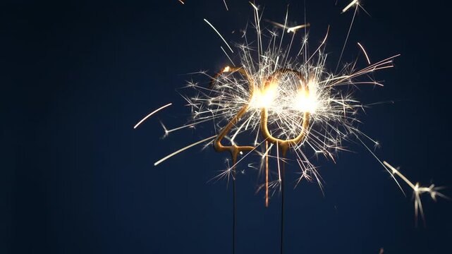 20 years anniversary celebration festive footage made with Bengal fire in the form of number Twenty