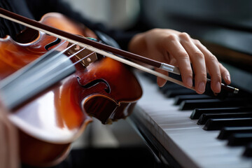 Musician performing on piano and violin in a cozy indoor setting during afternoon light