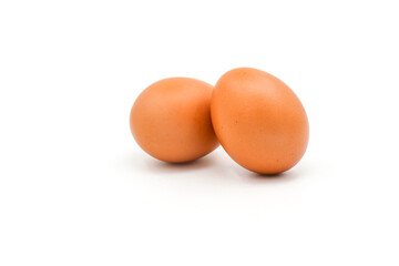 Eggs on a white background are a good source of protein. which helps build and repair worn out parts of the body.