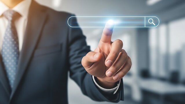 A business man in a suit touching a search bar on a screen in a bright environment