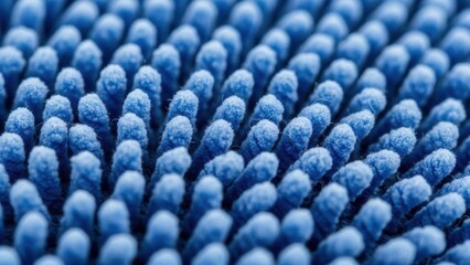 Macro shot of fuzzy blue textile fibers