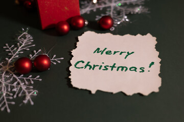 A festive Christmas composition featuring a handwritten “Merry Christmas”