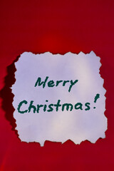 A festive Christmas composition featuring a handwritten “Merry Christmas”