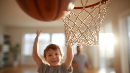 A child experiences the joy of indoor basketball jumping and aiming for the net with a parent nearby in a sunlit home