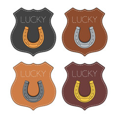 Set of color illustrations with horseshoe emblem and the inscription "lucky". Isolated vector objects on white background.