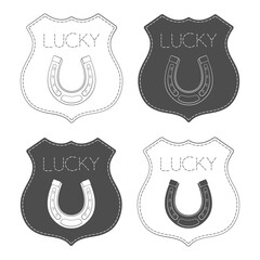 Set of black and white illustrations with horseshoe emblem and the inscription "lucky". Isolated vector objects on white background.