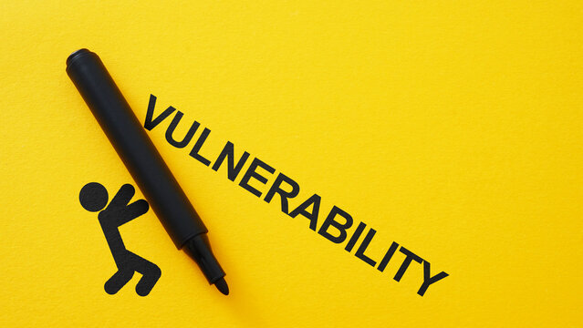 Vulnerability as Weakness Concept with Falling Figure and Marker on Yellow Background