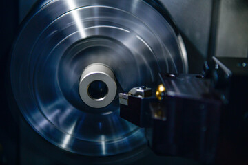 Spindle cutting tool Rotary 5-axis CNC milling machine during deburring of engine parts, heavy...