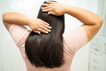 Naklejka premium Woman with beautiful shine hair care treatment.