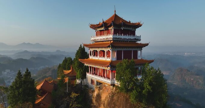 Sunrise and ancient chinese buddha temple landscape in Hunan province,China