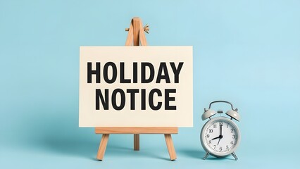 Important holiday notice displayed on easel with vintage clock, perfect for office announcements, employee communications, or seasonal business reminders