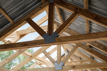 Obraz premium Building Framework: Metal Trusses Joined with Timber Elements
