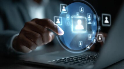 Connecting and managing a vast network of people through a modern digital interface on a laptop, emphasizing global reach - Powered by Adobe