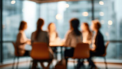Blurred Image Of Professional Women Collaborating In Modern Conference Meeting Space, Out Of Focus.