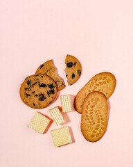 Assortment of Sweet Snacks: Chocolate Chip Cookies, Biscuits, and Wafers