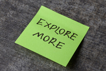 Motivational sticky note on wood