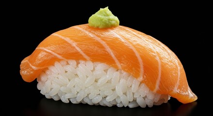 Close up of fresh salmon nigiri sushi with wasabi topping on black background