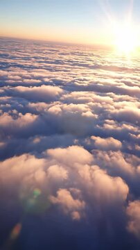 Dramatic aerial drone shot sweeping over a dense layer of pure white fog covering an infinite blank ocean surface extending to the misty horizon travel, subliminal, tranquility