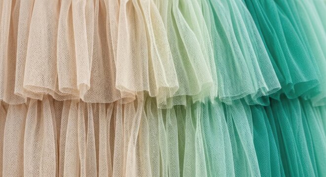 Closeup of layered tulle fabric showing a soft color gradient
