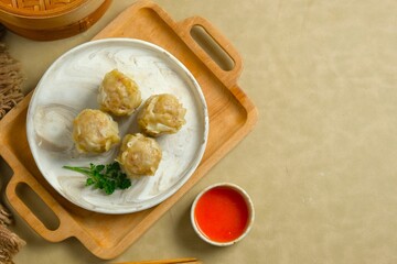 Dimsum, dim sum, shumay, shaomai , dumplings or siomay for recipe, menu book or food design. Chinese food made from shrimp or chicken. Oriental food