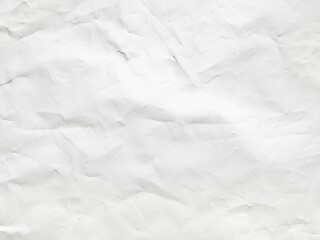 crumpled white paper texture closeup with wrinkles and folds on light blue background