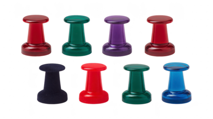 Colorful magnet push pins in red, green, purple, and blue arranged in two rows on transparency background, used for office or school organization, vibrant and playful