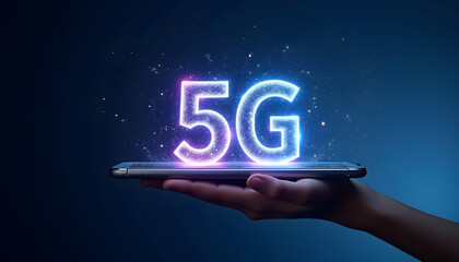 5G technology concept with glowing text on a smartphone held in a hand
