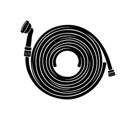 Garden hose coiled neatly with spray nozzle ready for watering plants and lawn care needs