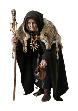 Norse volva seeress witch casting runes with wolf fur
