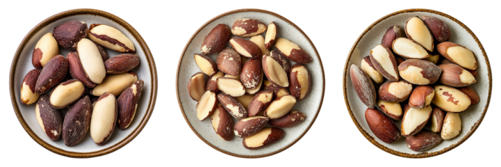 A high-angle shot featuring three small bowls filled with Brazil nuts, each bowl showcasing a different arrangement of these nutritious snacks. The nuts have a mix of brown and beige tones