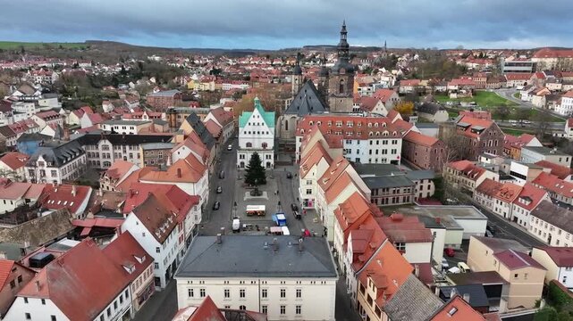 Drone under Luther City Eisleben&rsquo;s market square, showing town hall, church, and historic streets. Birthplace of Martin Luther, rich in heritage and festive decorations.