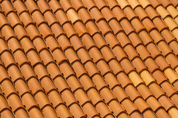 Close-up of terracotta roof tiles in diagonal pattern