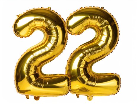 Two large, shiny, golden number 22 balloons