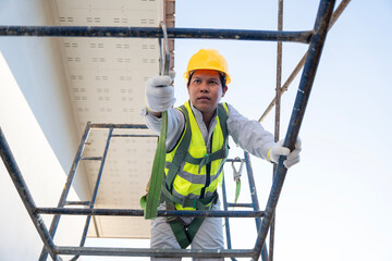 Construction worker performing tasks on scaffolding urban setting photography bright day close-up...