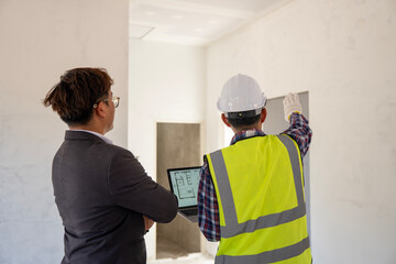 Construction progress review meeting building site professional interaction urban environment team collaboration project management