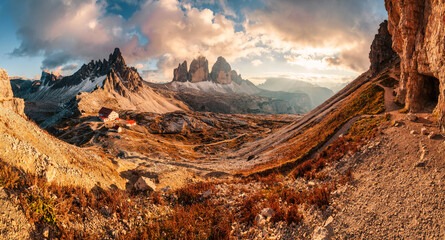 Scenic view of Tre Cime di Lavaredo peaks and mountain hut in the sunset at Dolomites, italy