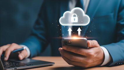 Cloud security concept with man using smartphone and laptop for data transfer