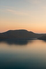 Fototapeta premium Twilight over a quiet caldera lake
