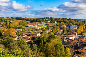 Panorama of the small town of Venerque along the Ari&egrave;ge River with its fortified church in autumn