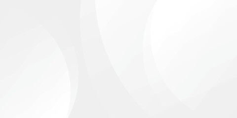 Abstract white and light grey background with soft, smooth, and flowing gentle curves creating a subtle pattern.