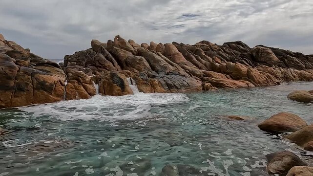 Injidup Natural Spa, Overcast Sky Over Unique Rock Pool with Crashing Waves and Sculpted Granite Formations, Western Australia