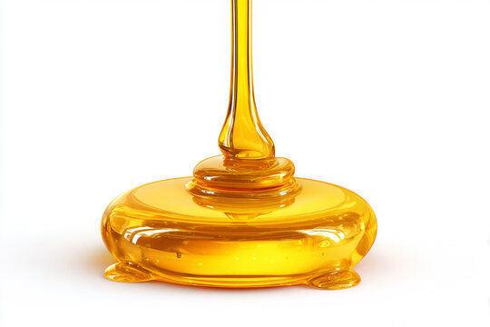 thick viscous golden liquid honey pouring and dripping onto a surface