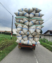 Overload truck running on road. Shipping transportation illustration.